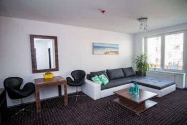 Deluxe One-Bedroom Suite (2 Adults + 2 Children)
